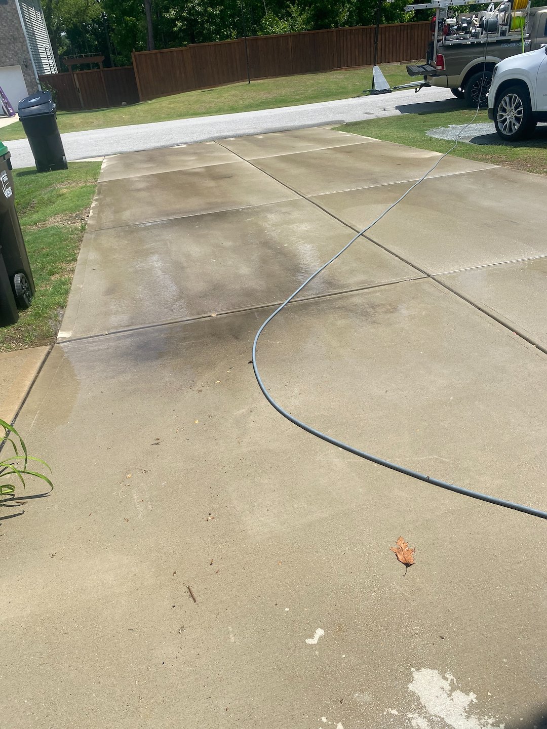 concrete driveway revived, and curb appear improved